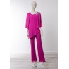 Ensemble pantalon mariage en mousseline rose fuchsia, tunique asymétrique drapée et appliqué strass sur l'épaule
