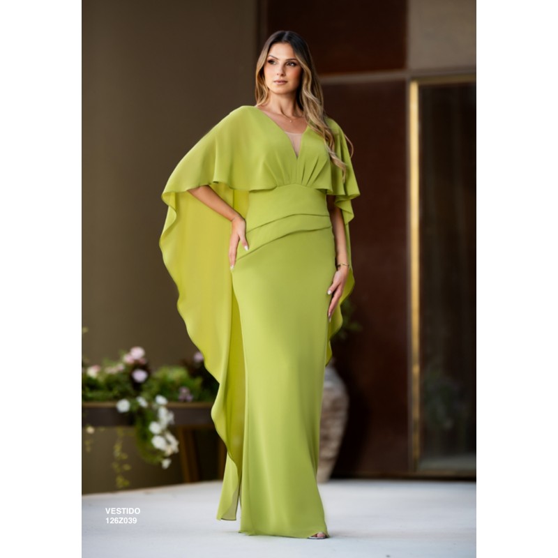 Robe de cocktail mariage longue en mousseline vert anis, col V illusion, cape manches volantes et silhouette fourreau