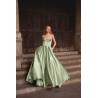 Robe de cocktail mariage longue en satin vert sauge, bustier corset cœur et jupe princesse évasée avec poches